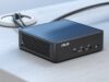 ASUS NUC 15 Pro (NUC15CRK) Review: The DIY Mini PC That Feels Smarter Than It Looks ASUS NUC 15 Pro (NUC15CRK) barebones mini PC with Intel Core Ultra 5 processor displayed on desk setup.