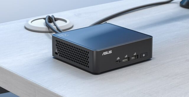 ASUS NUC 15 Pro (NUC15CRK) barebones mini PC with Intel Core Ultra 5 processor displayed on desk setup.