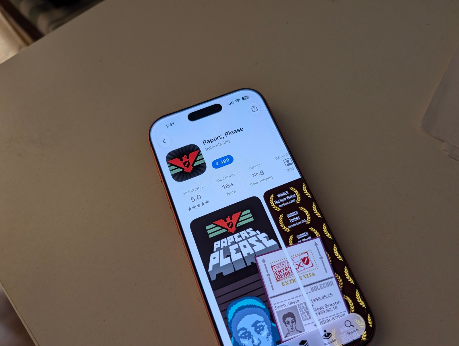 Papers, Please App Store page on iPhone priced at ₹499 and ranked No. 8 in Role-Playing